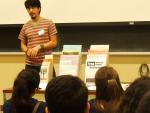 Volunteer Manuel Enriquez speaks in a classroom.