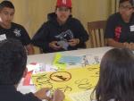 Students networking at an annual Project YANO community gathering.